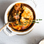 Beef and stout pie garnished with thyme