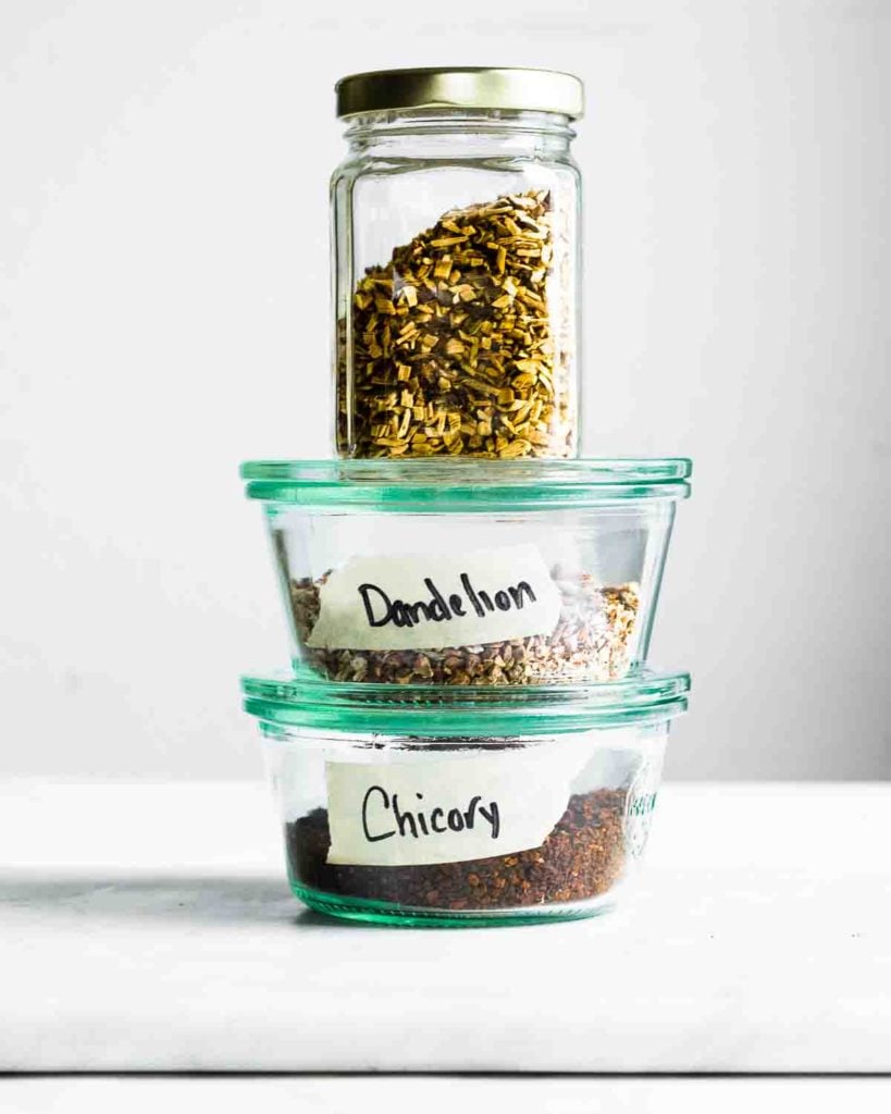 Ingredients for dandelion mocha (licorice, dandelion and chicory) in jars.