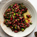 marinated kidney beans in an earthenware dish