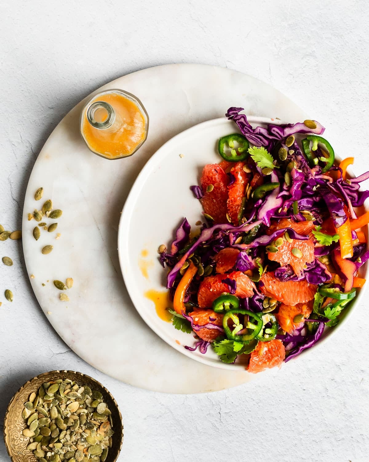 cabbage salad with jalapenos, pepitas, grapefruit and cilantro
